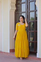 Yellow Faux Blooming Designer Round Neck Embroidery Work Gown