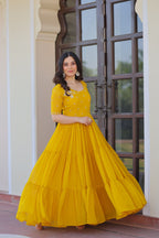 Yellow Faux Blooming Designer Round Neck Embroidery Work Gown