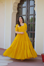 Yellow Faux Blooming Designer Round Neck Embroidery Work Gown